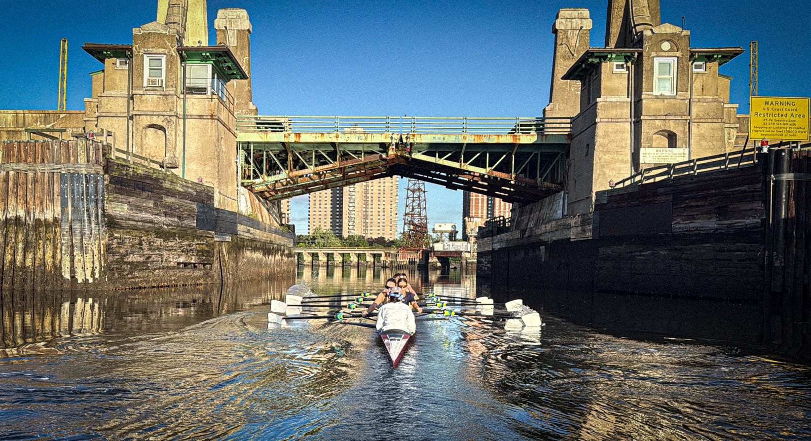 A quad coming through under the old railway bridge