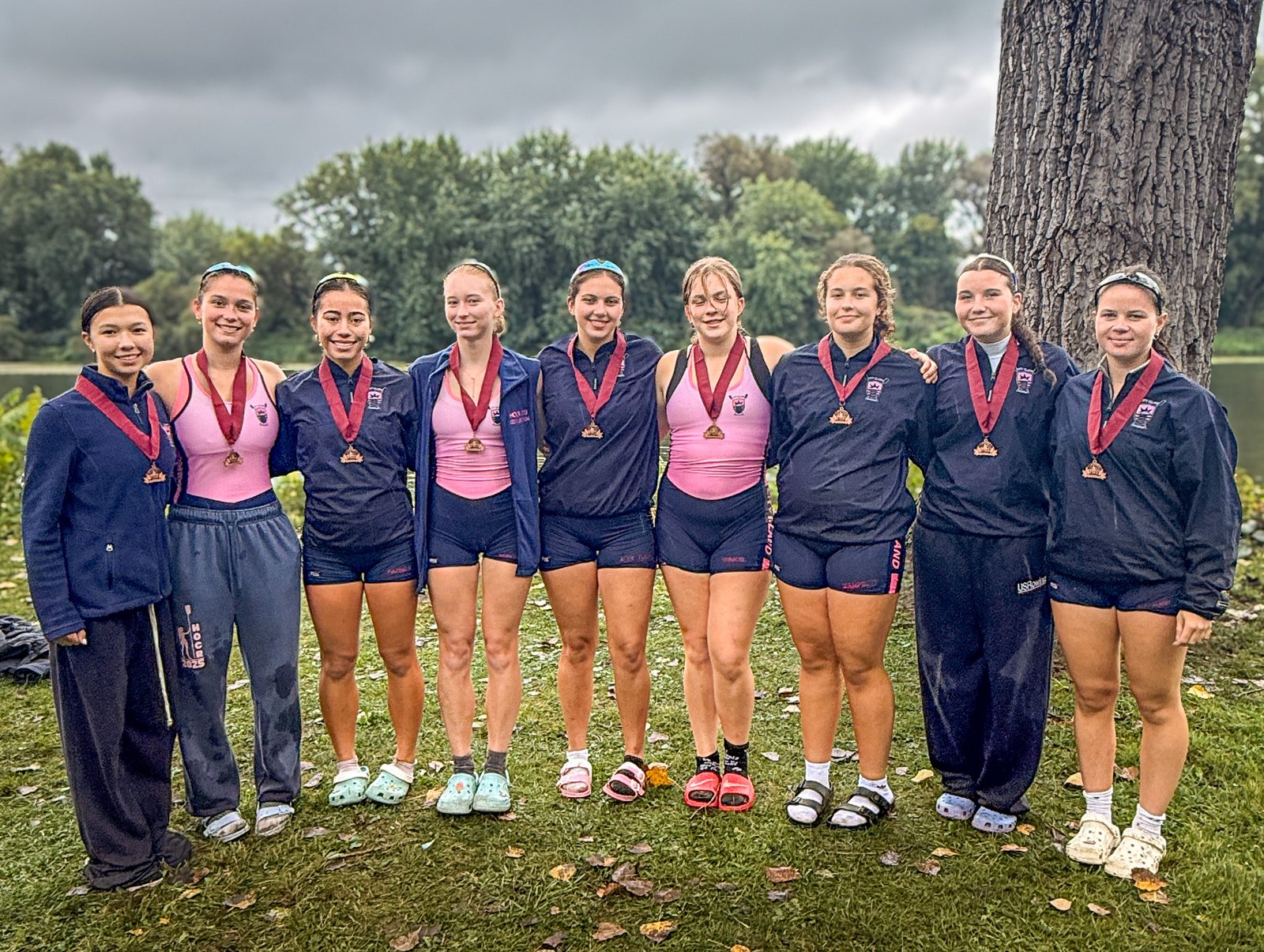 The first varsity eight with their bronze medals