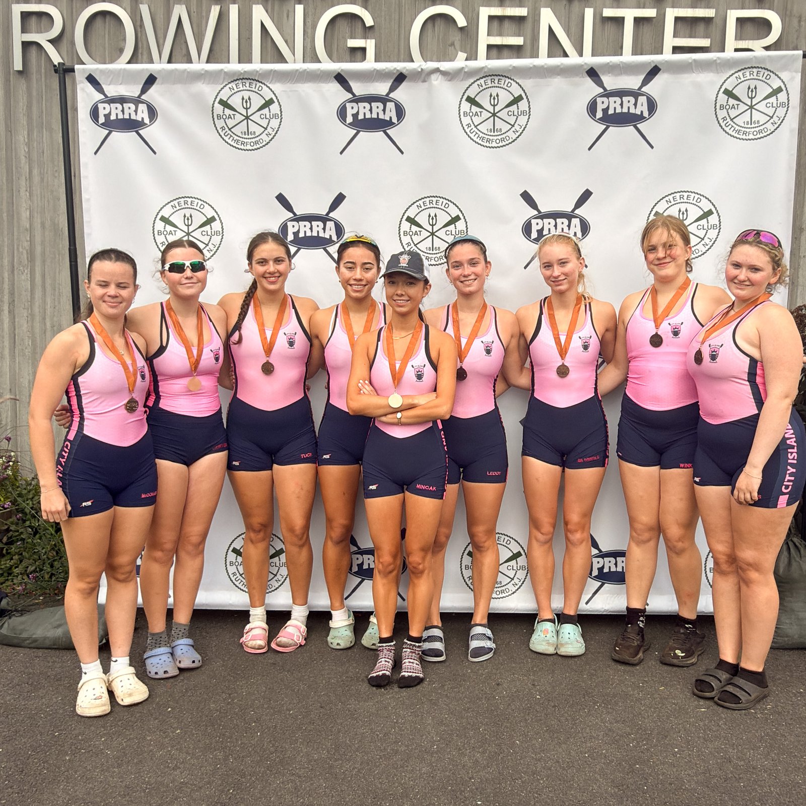 The 1V8+ with their bronze medals