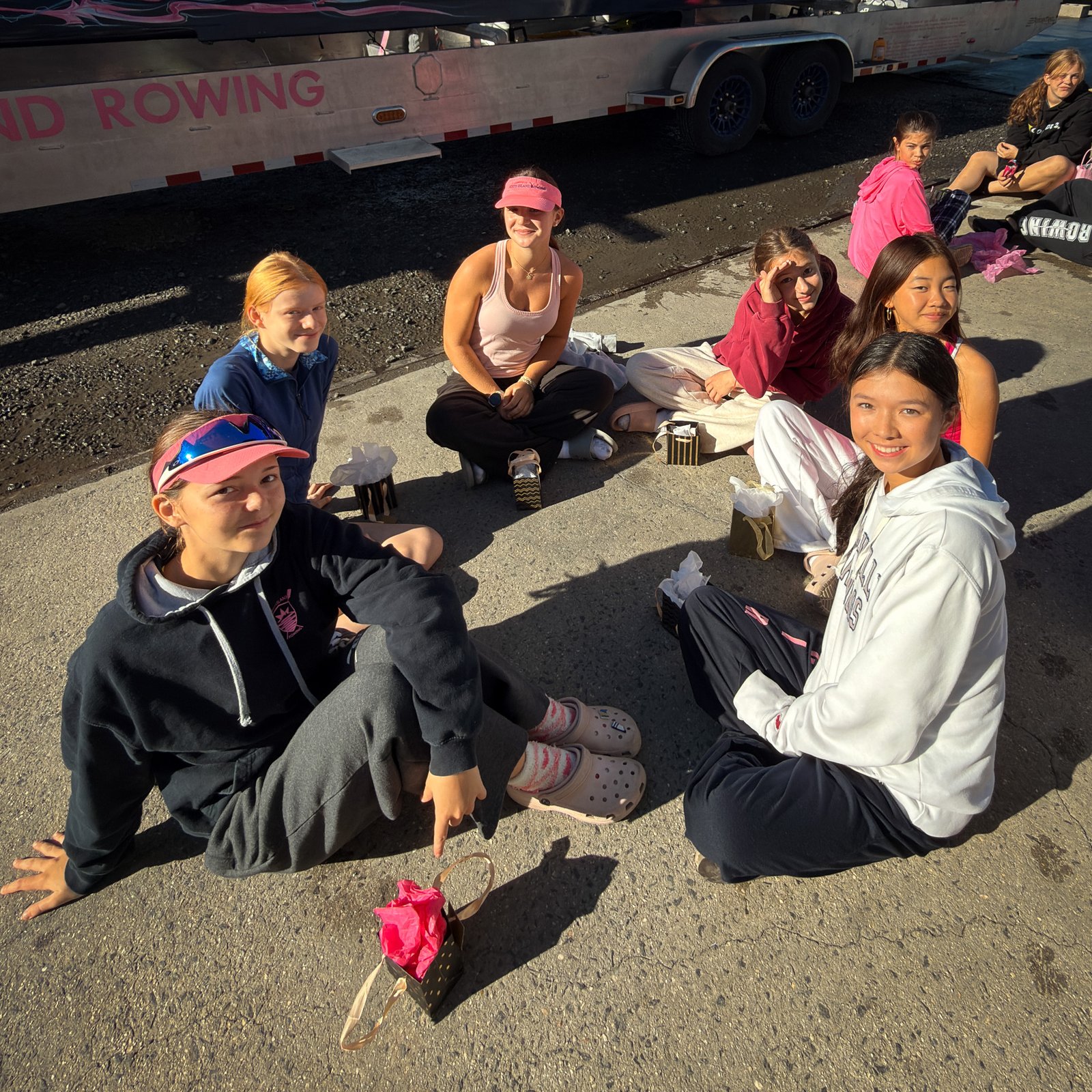 A sister group in the sun by the trailer
